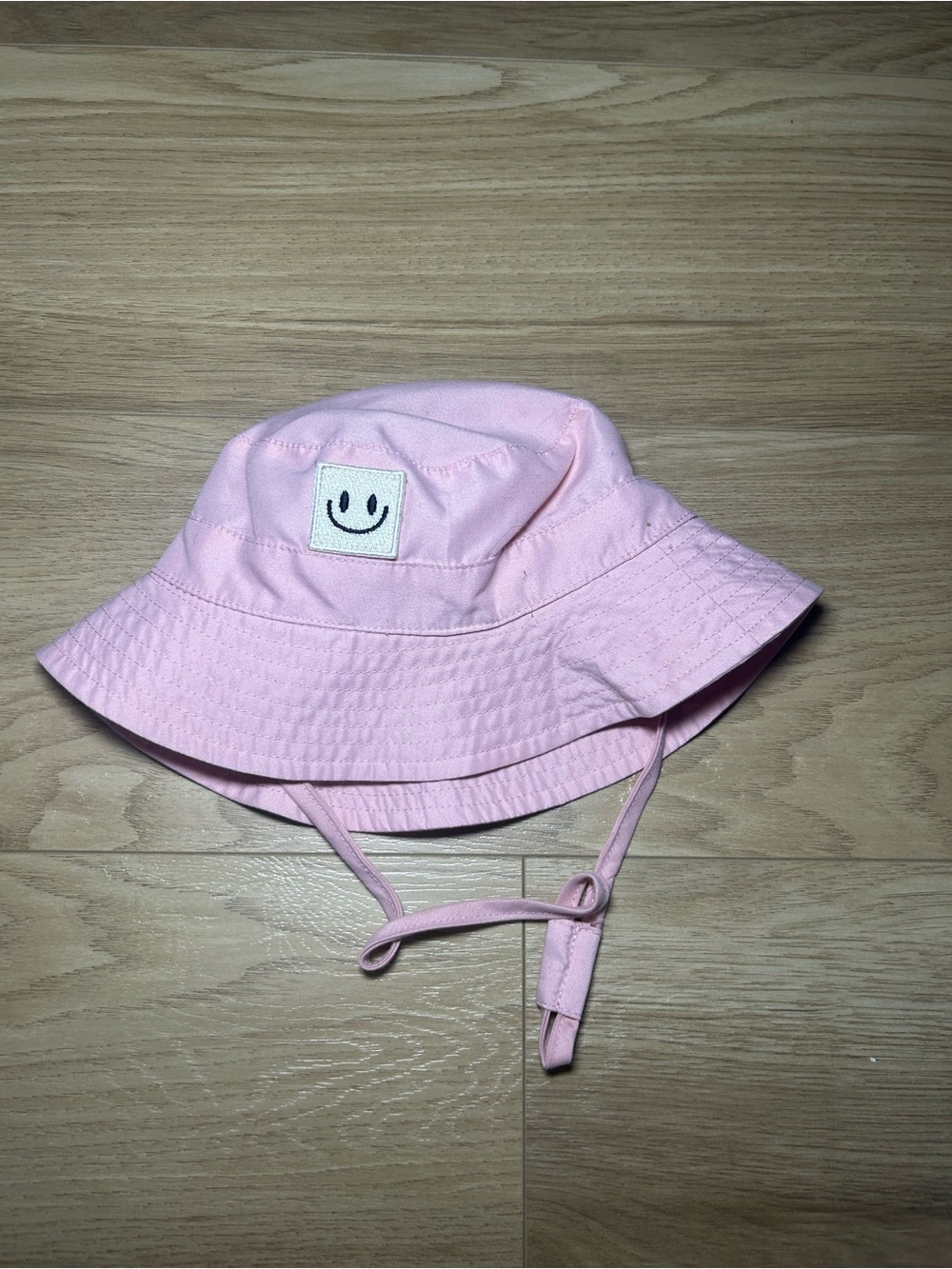 Pink Kids Bucket Hat with Smiley Patch and Chin Ties